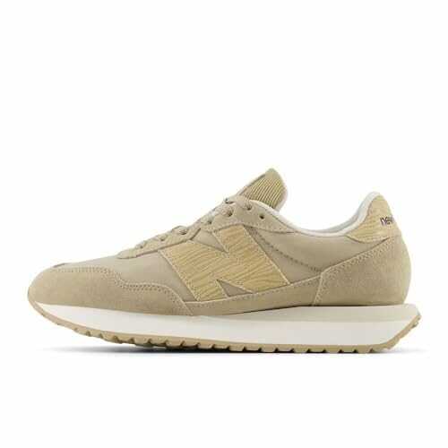 Beige sneaker with white sole, side view
