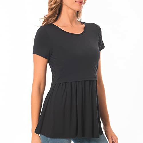 Woman wearing a black short sleeve peplum top