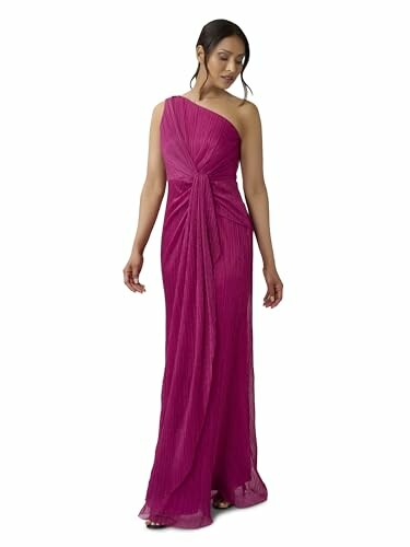 Woman wearing a magenta one-shoulder evening gown.