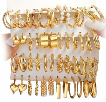 Set of various gold hoop earrings in different designs.