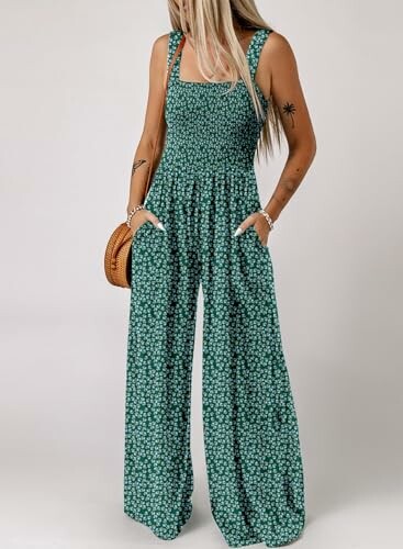 Woman wearing a green floral jumpsuit with wide legs