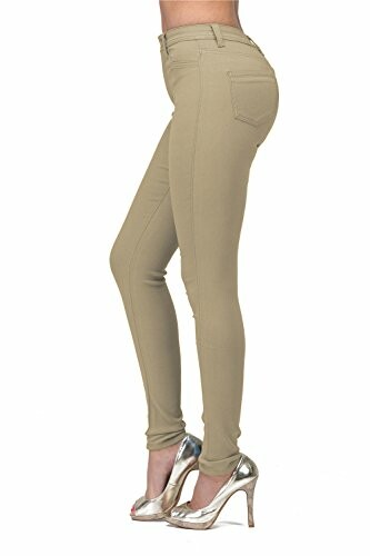 Person wearing khaki skinny jeans with silver high heels.