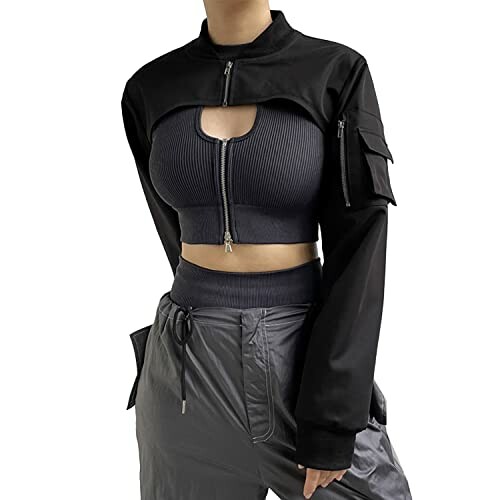 Woman wearing a black crop top and matching pants.