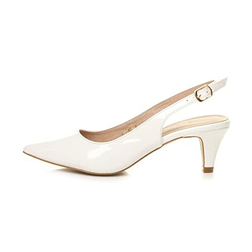 White slingback pump shoe with medium heel.